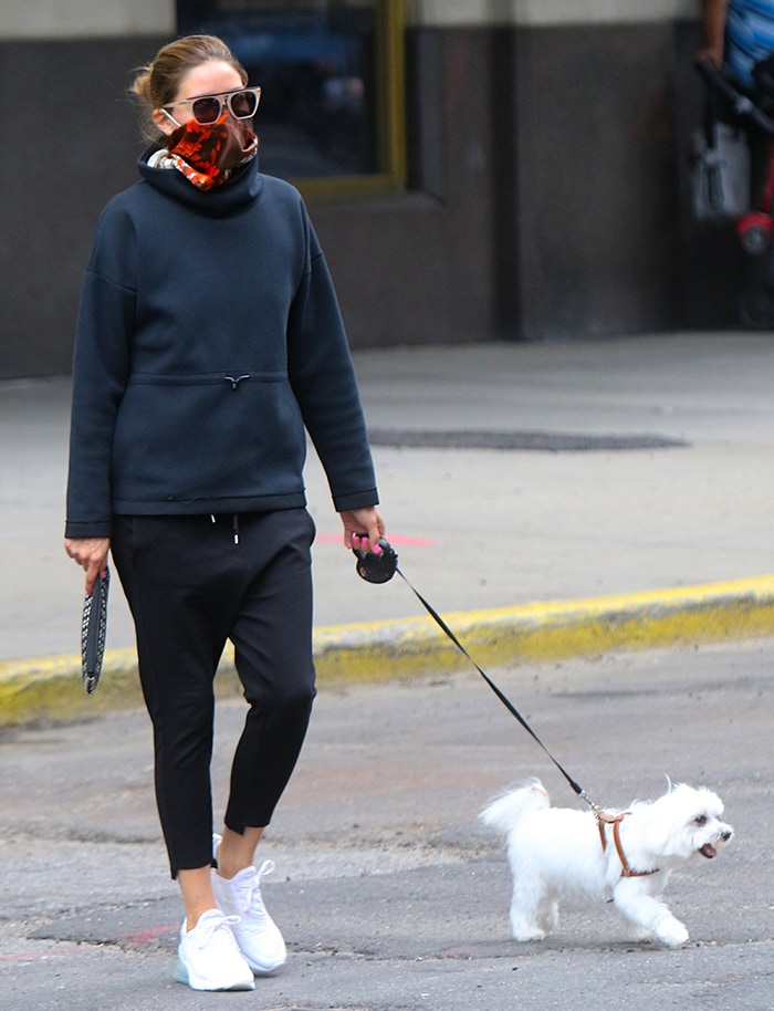 Olivia Palermo takes Mr. Butler out for a walk in an athleisure outfit in Downtown, Brooklyn