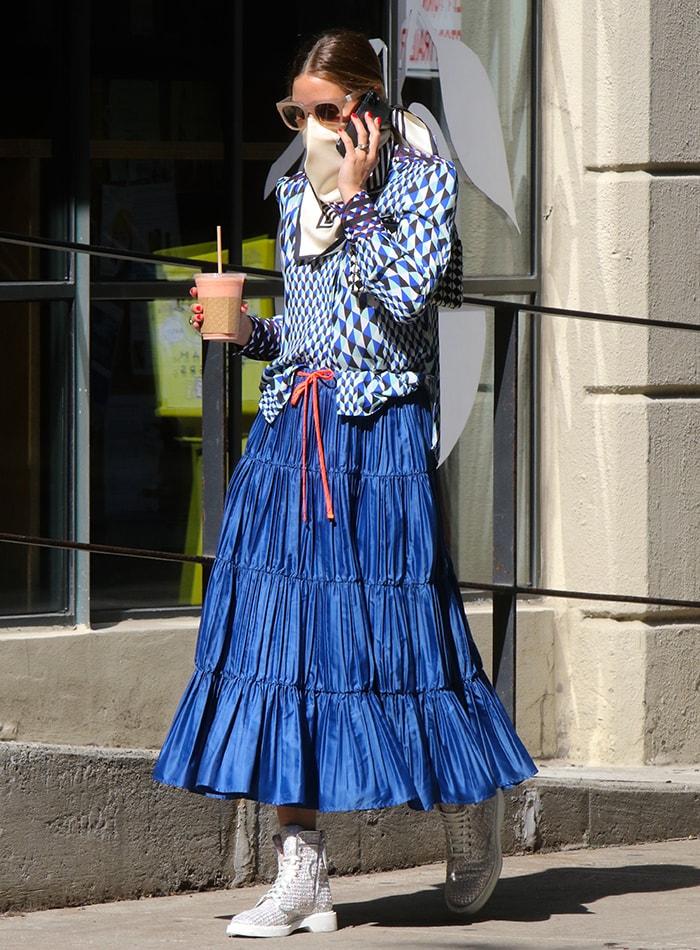 Olivia Palermo steps out in a Max & Co. maxi skirt to get her coffee