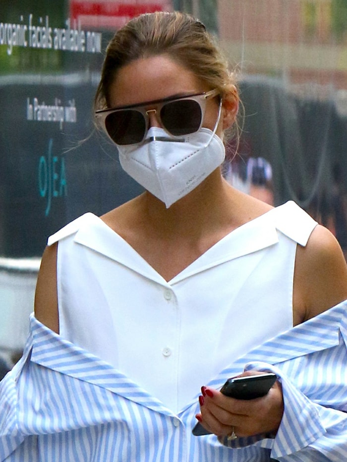 Olivia Palermo helps prevent coronavirus from spreading with a KN95 face mask