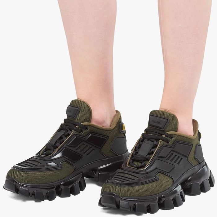 Crafted from a military green technical fabric upper and black three-dimensional injected rubber eyestay elements, these Cloudbust Thunder sneakers feature a round toe, a lace-up front fastening, a logo patch at the tongue, branded heel counter and a Sawtooth rubber sole