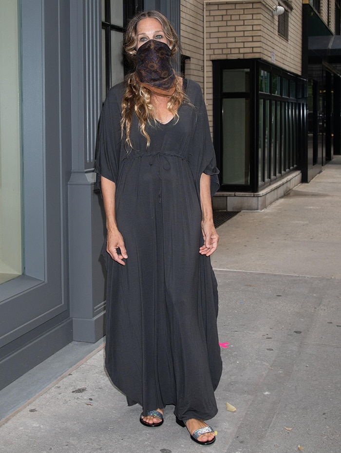 Sarah Jessica Parker slips into a charcoal-colored boho-style maxi dress