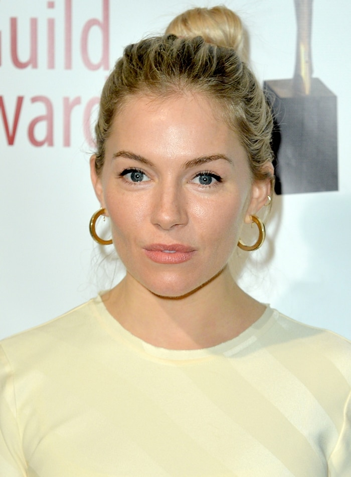 Sienna Miller's Rebecca Vallance dress and square design Jennifer Fisher hoop earrings inspired by celebrity stylist Erin Walsh