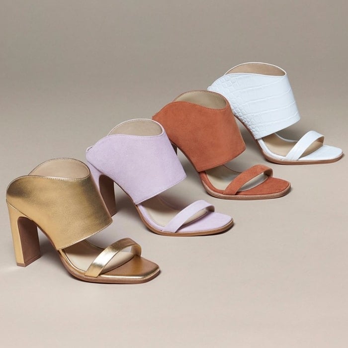 A double-band slide crafted from soft suede is lifted by a contemporary, rectangular heel