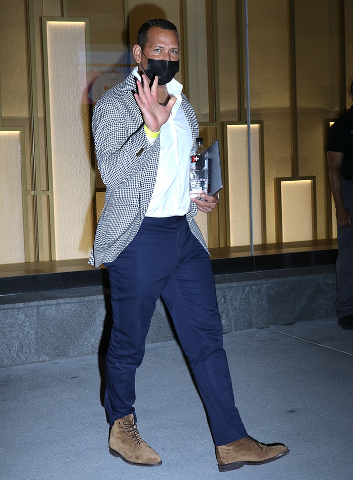Alex Rodriguez, Jennifer Lopez's fiancé, looks dapper in a gingham blazer and navy trousers