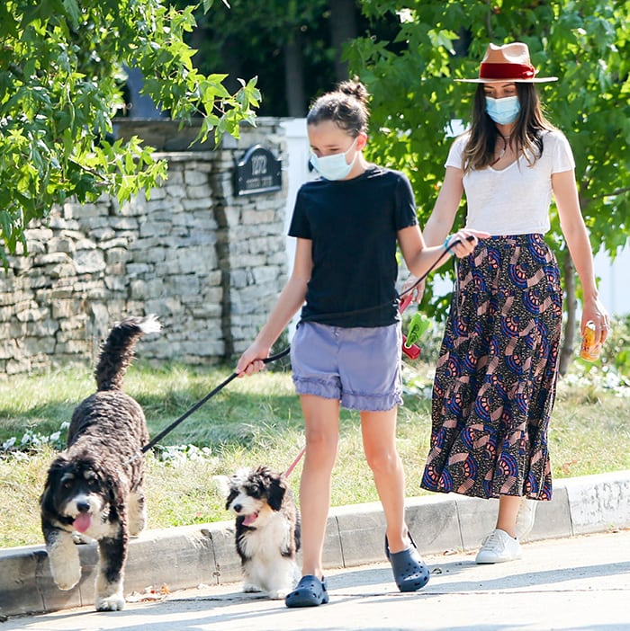 Ana de Armas and Seraphina Affleck take their adorable dogs for a stroll, with Ana’s small pup leading the way alongside Seraphina’s larger furry companion