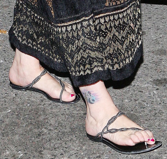 Carrie Fisher's galaxy ankle tattoo and small feet