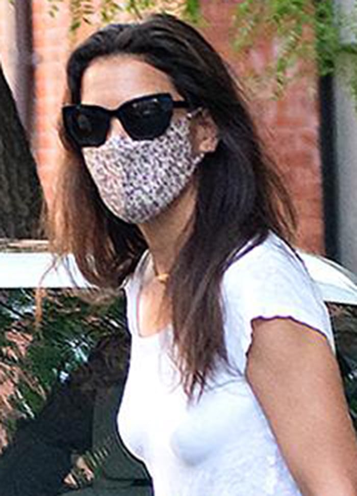 Katie Holmes wears Prada sunnies with a printed face mask