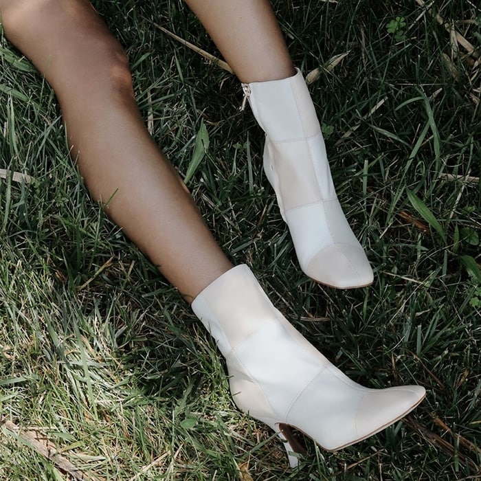 The Olina ankle booties offer a patchwork design that oozes elegance