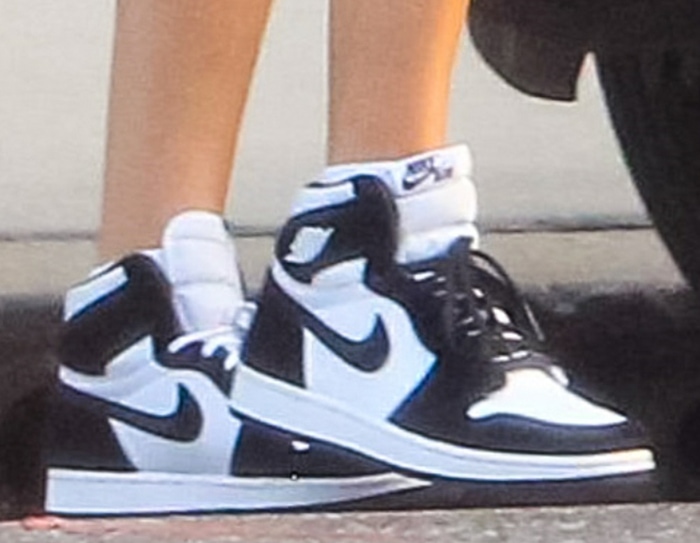 Ashley Benson rocks a pair of Nike Air Jordan 1 high-top sneakers