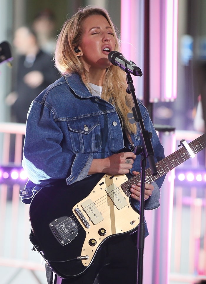 Ellie Goulding plays the guitar at the BBC One Show in London