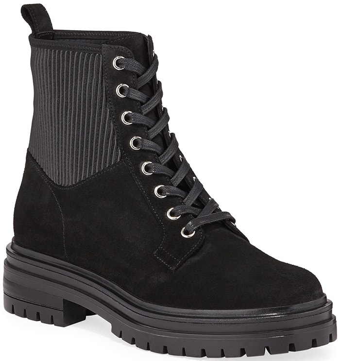 Edgy combat boots merge a smooth leather construction with rib-knit inserts