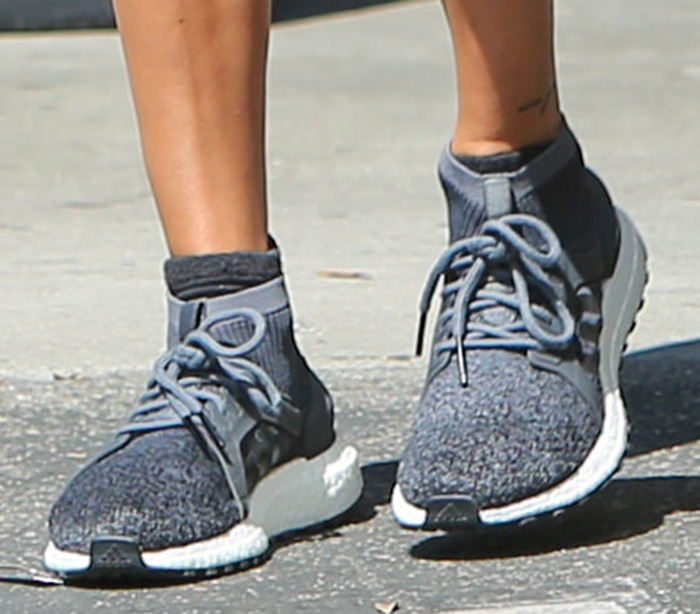 Hailey Bieber teams her athleisure look with Adidas Ultraboost X All Terrain shoes