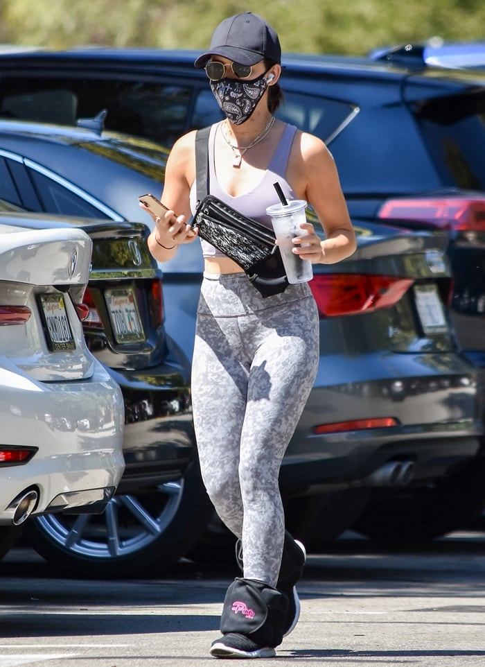 Lucy Hale paired Alo Yoga's Real bra tank with high-rise Lululemon Wunder Train leggings