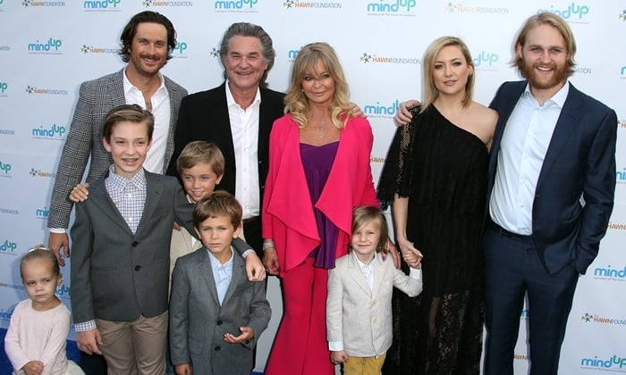 Oliver Hudson, Oliver's children, Bodhi, Rio, and Wilder Hudson, Kurt Russell, Goldie Hawn, Kate Hudson, Kate's sons, Ryder Robinson and Bingham Bellamy, and Wyatt Russell