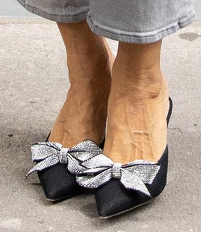 Sarah Jessica Parker completes her gray look with SJP Paley embellished bow mules