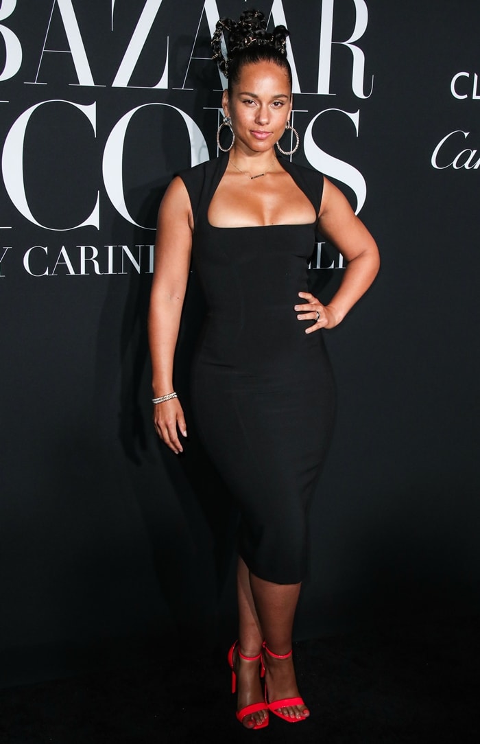 Alicia Keys wore a form-fitting black Mugler dress and Saint Laurent heels