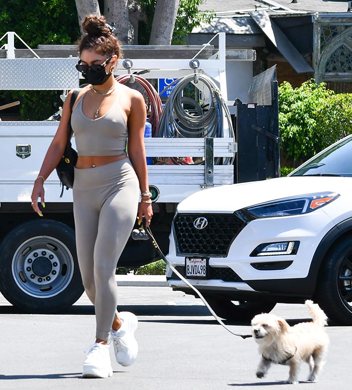 Vanessa Hudgens walks her dog, Darla, around her Los Angeles neighborhood on August 26, 2020