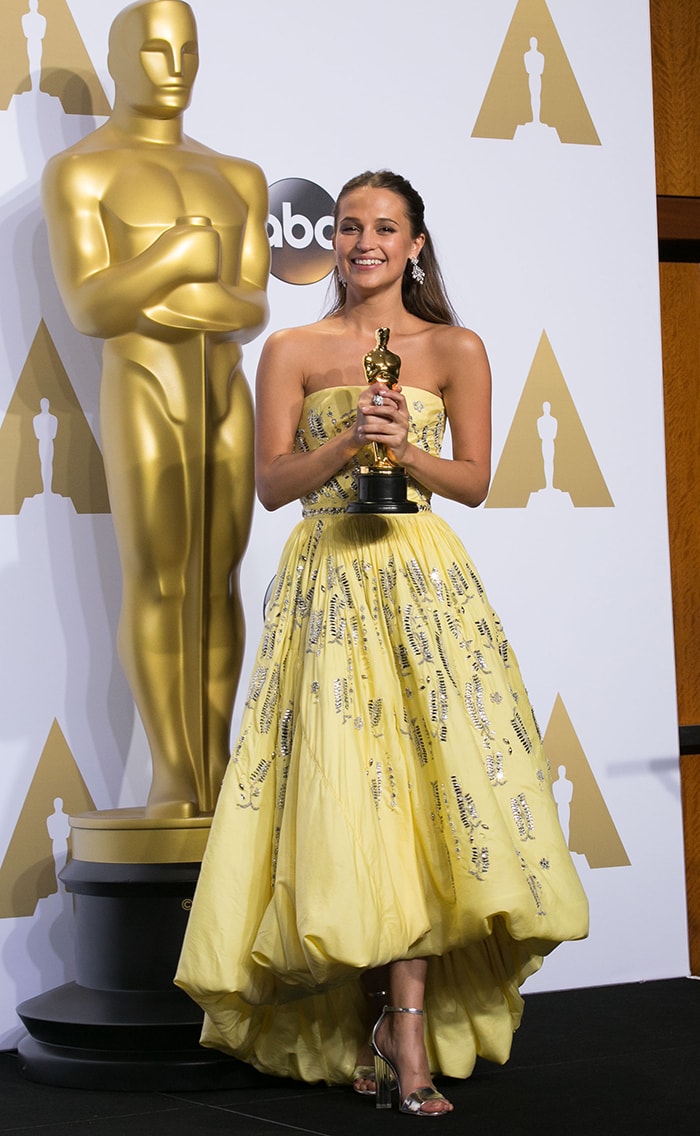 Alicia Vikander wins Academy Awards for Best Supporting Actress for The Danish Girl on February 28, 2016