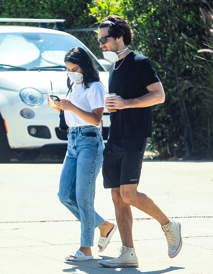 Camila Mendes and then boyfriend Charles Melton run errands in Los Angeles on May 8, 2020