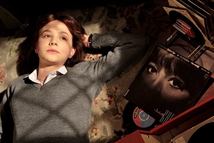 Carey Mulligan as a teenage girl in 1960s suburban London in An Education