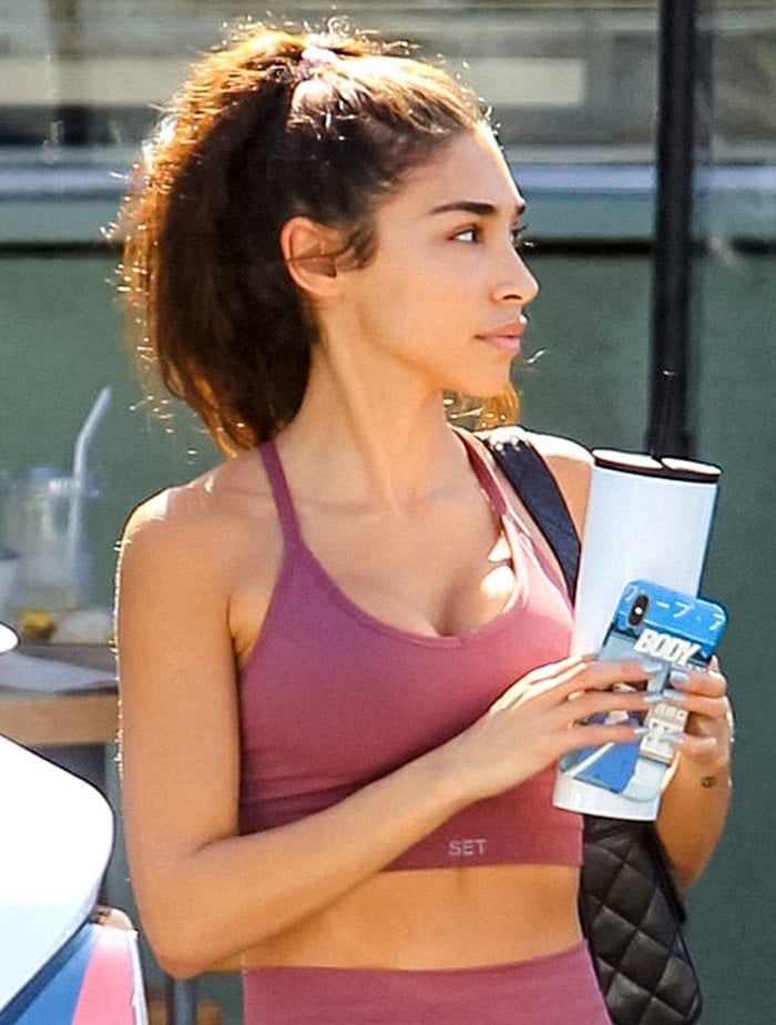Chantel Jeffries wears barely there makeup and a high ponytail