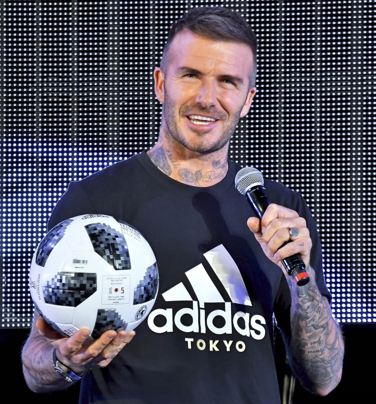 David Beckham showcasing Adidas' triangular mountain logo that represents the challenges athletes face