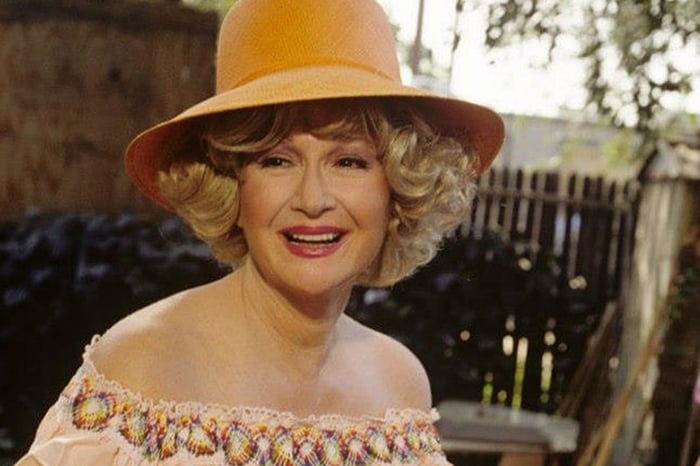 Diane Ladd as Lucille (Southern belle) in Hold Me Thrill Me Kiss Me, a 1992 American comedy film