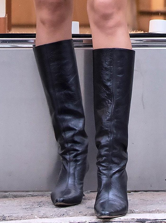 Irina Shayk completes her fall look with By Far mid-calf boots