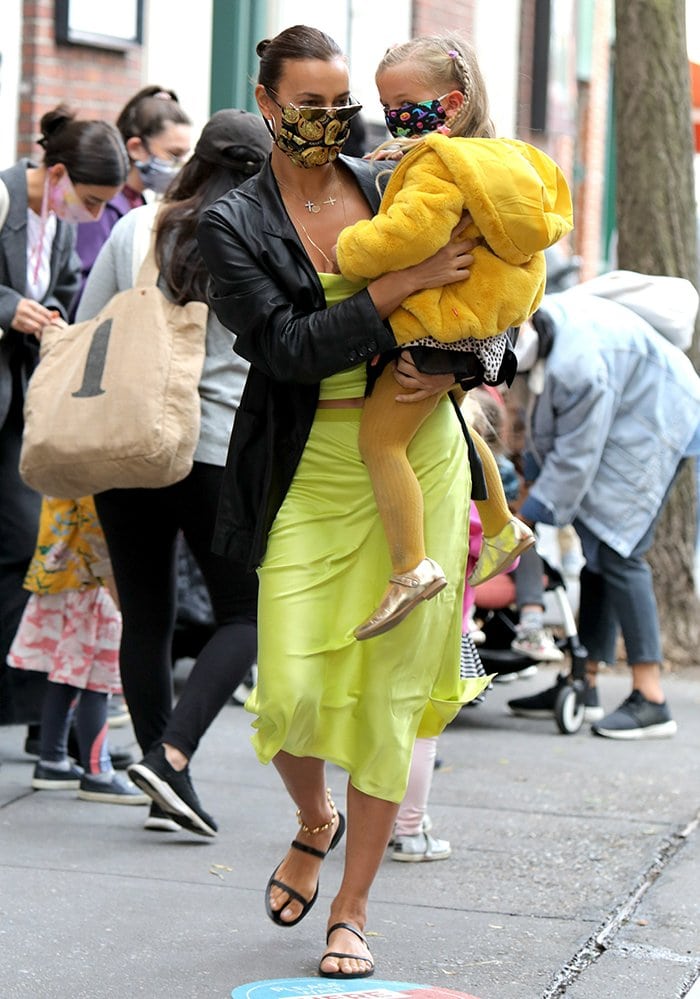 Irina Shayk wears a Cami NYC camisole and a matching midi skirt with J Brand x Elsa Hosk jacket