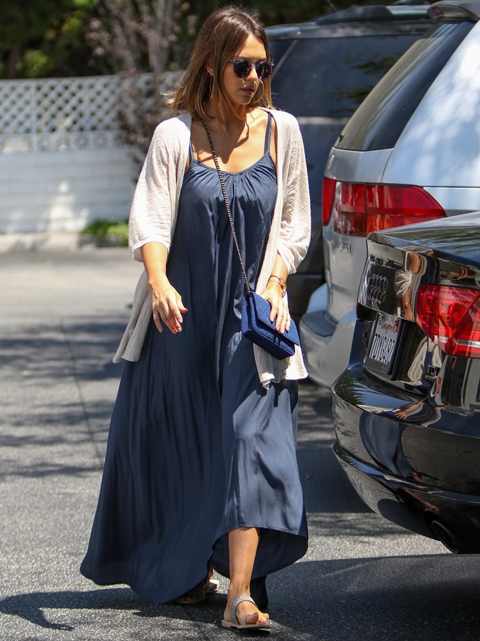 Jessica Alba wears Ariat's popular Copper Creek sandals with a maxi dress and cardigan