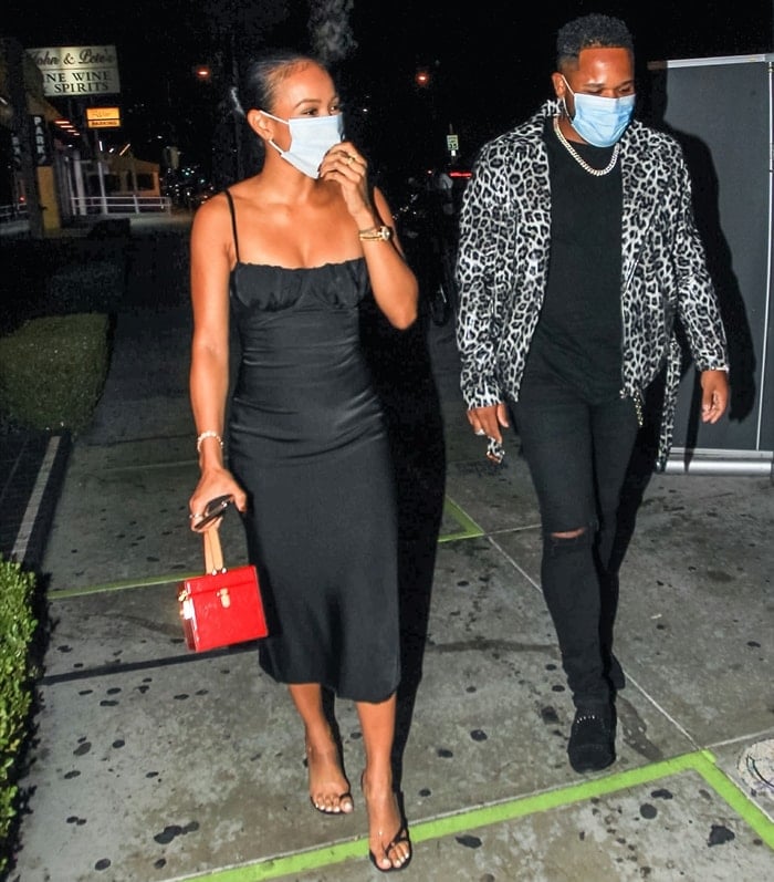 Karrueche Tran joins her close friend EJ King for a rooftop birthday party