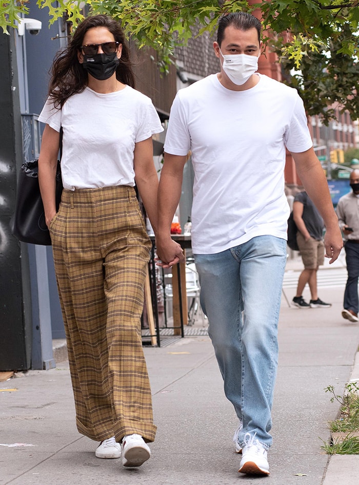 Katie Holmes steps back to the '90s in yellow plaid baggy pants and white tee