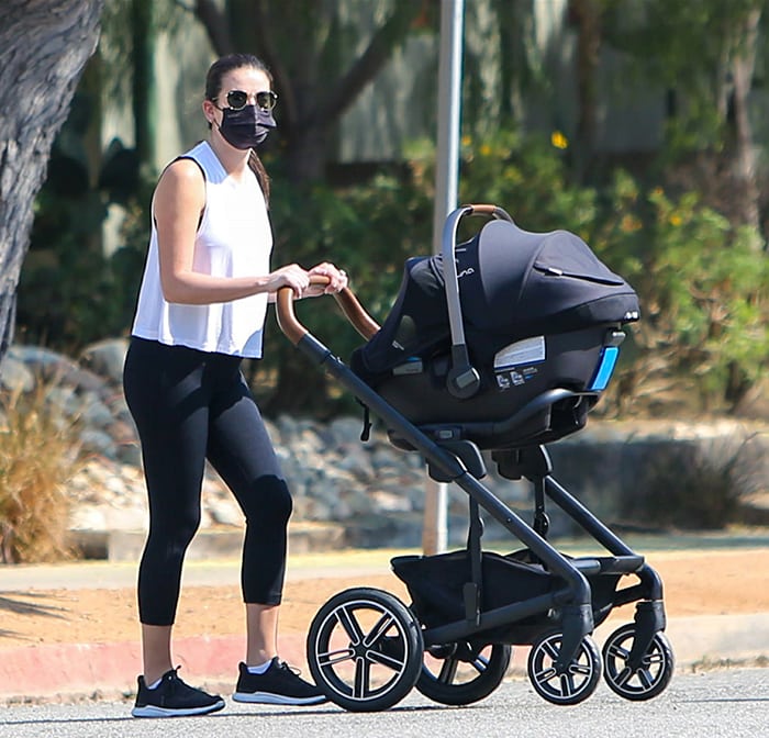 Lea Michele keeps it low-key with Ray-Ban Hexagonal sunglasses and black face mask