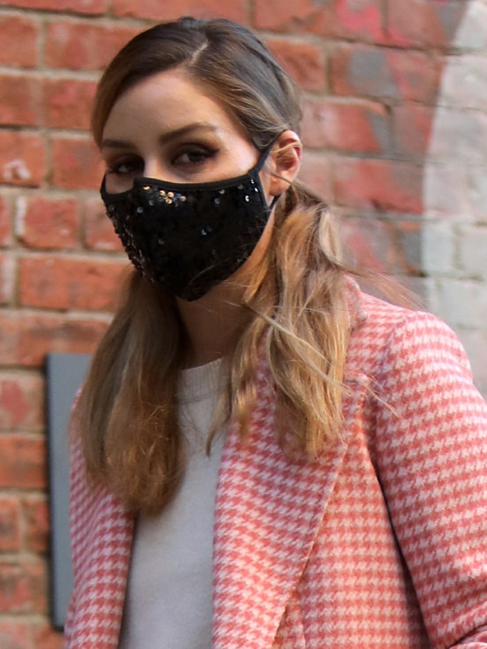 Olivia Palermo wears a stylish sequined face mask for protection against coronavirus