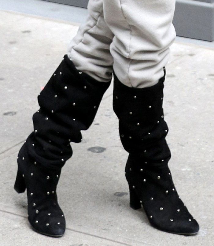 Sarah Jessica Parker tucks her sweatpants into a pair of SJP Busker knee-high boots