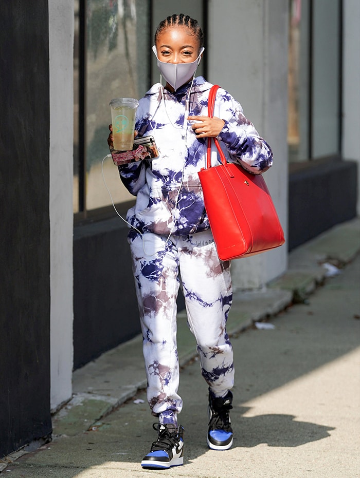 Skai Jackson on her way to rehearsals in a tie-dye hoodie, joggers and Nike hi-top sneakers