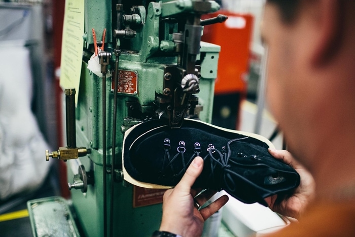 Stitching the upper to the midsole at Danner's factory in Portland, Oregon