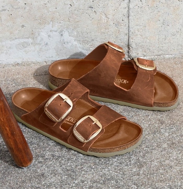 Treat your feet with Birkenstock's comfortable two-strap Arizona big buckle sandals