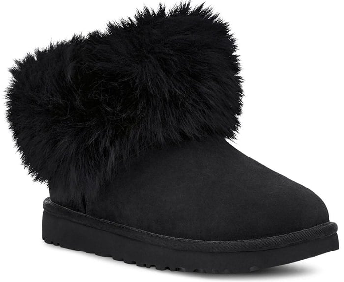 A plush, short shaft of fluffy genuine shearling adds extravagant texture to a fan-favorite bootie updated for a modern look
