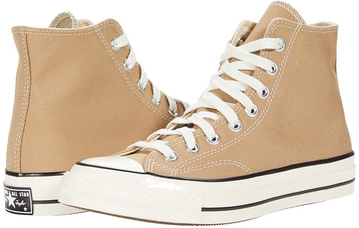 A visual update on the original basketball shoes, the Converse Chuck 70 Organic Canvas Hi sneakers add retro vibes and styling to your daily look
