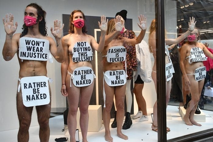 Extinction Rebellion protesters in central London demonstrate against the environmental harms of fast fashion