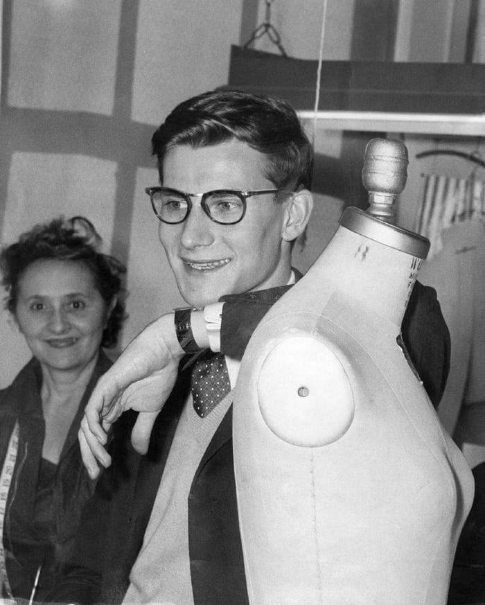 Fashion designer Yves Saint Laurent at the Dior factory showroom in 1958