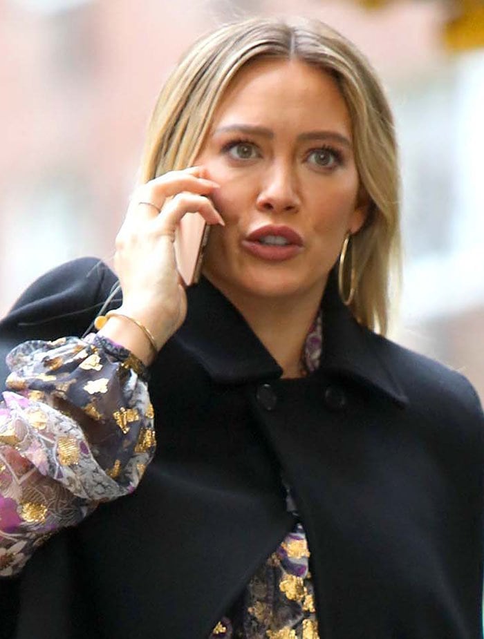 Hilary Duff wears her blonde hair down and glams up with a natural makeup look