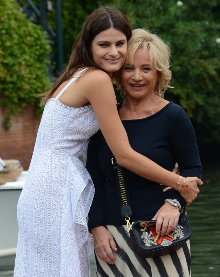 Italian fashion designer Alberta Ferretti (R) and Brazilian model Isabeli Fontana at the 74th Venice Film Festival in 2017