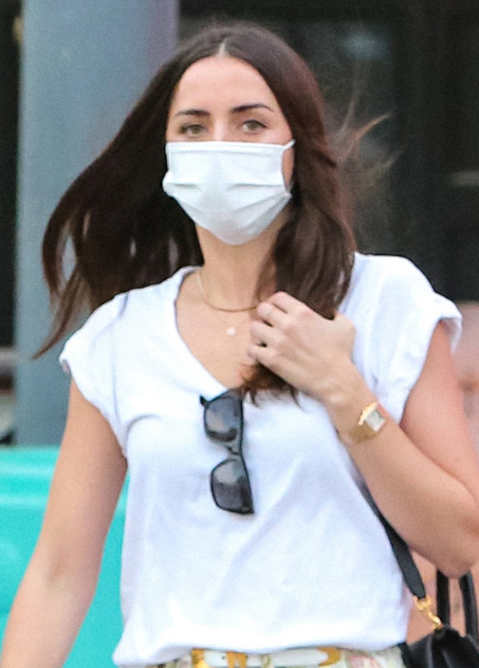 Ana de Armas wears her hair loose and stays protected with a Wakamono face mask