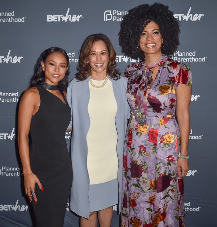 Claws actress Karrueche Tran posing with politician Kamala Harris and television writer Janine Sherman Barrois