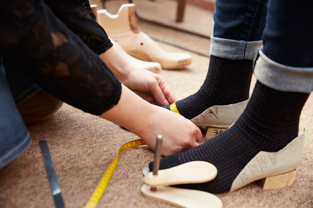 You can get your feet measured professionally by a podiatrist, use a Brannock device at a store or measure your shoe size at home