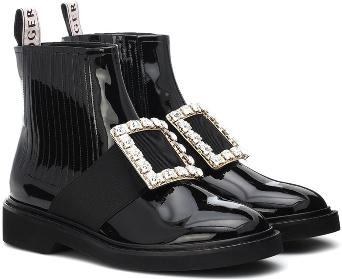 Roger Vivier reinvents the classic Chelsea boot silhouette by rendering it in glossy patent leather