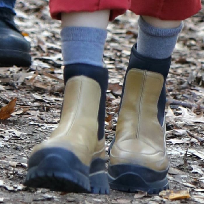 Selena Gomez stays warm with gray socks and Stella McCartney ankle boots