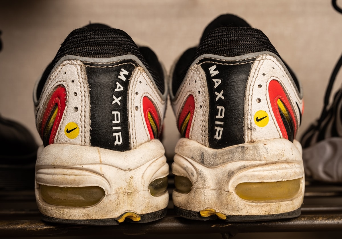 Used and dirty Nike Air Max Tailwind IV sneakers from behind